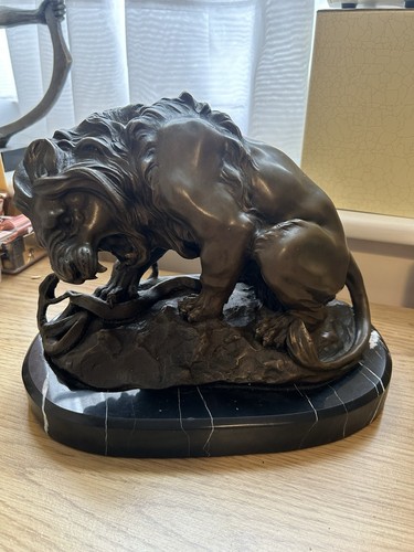 Large bronze lion fighting - lion,